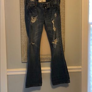 Ripped bell bottom jeans